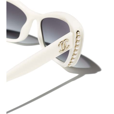 white frame chanel sunglasses|Chanel sunglasses with white trim.